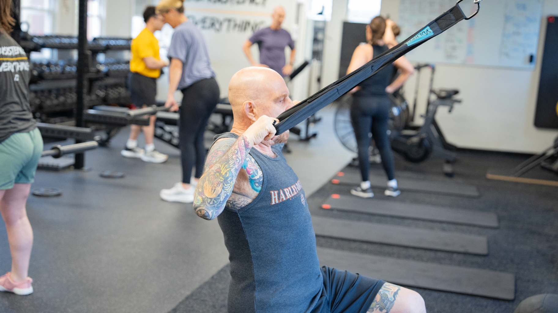 Member training with assistance inside Breakthrough Performance gym